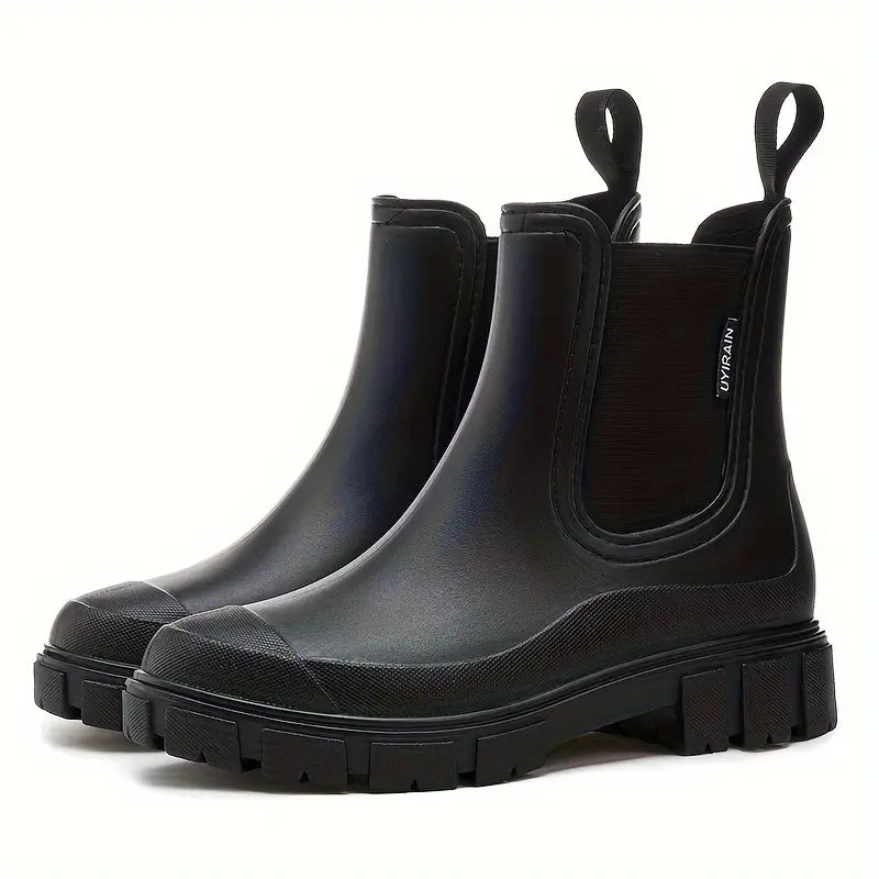 Women's waterproof slip-on Chelsea boots in sleek black with elastic side panels for easy wear