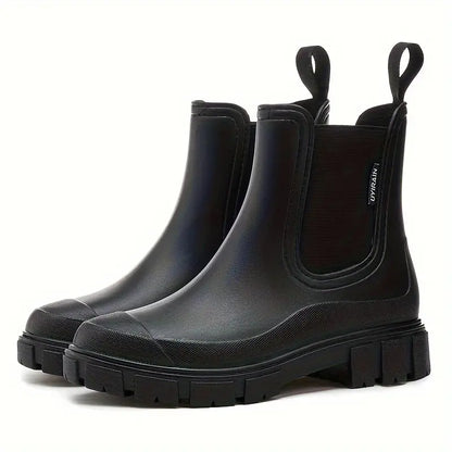 Women's waterproof slip-on Chelsea boots in sleek black with elastic side panels for easy wear