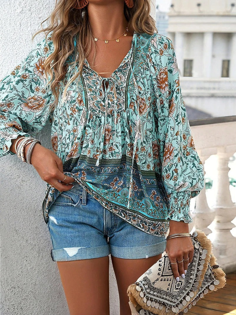 Women's floral summer top in vibrant hues, breezy boho fit with lightweight breathable fabric