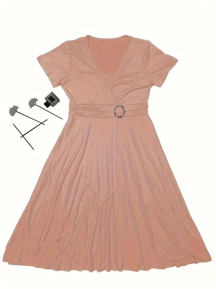 Women's deep navy wrap dress with V-neck, short sleeves, and elegant waist-cinching detail