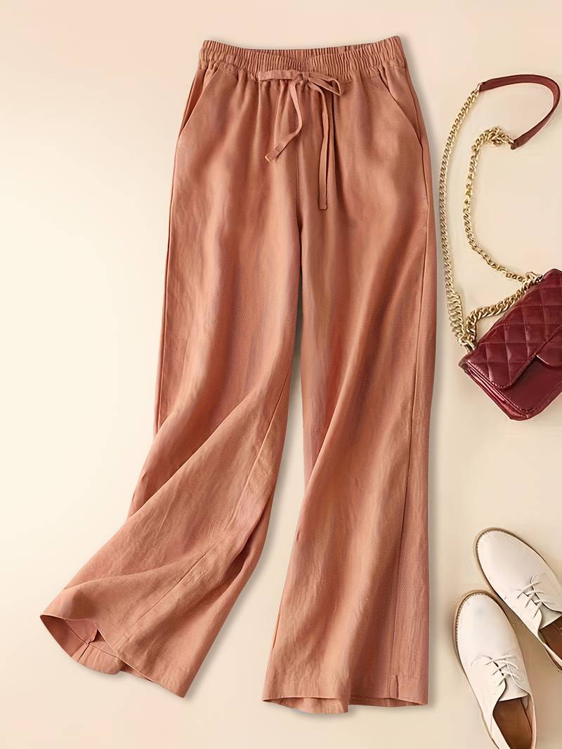 Earthy-tone relaxed drawstring pants with soft drape and breathable fabric for effortless casual style
