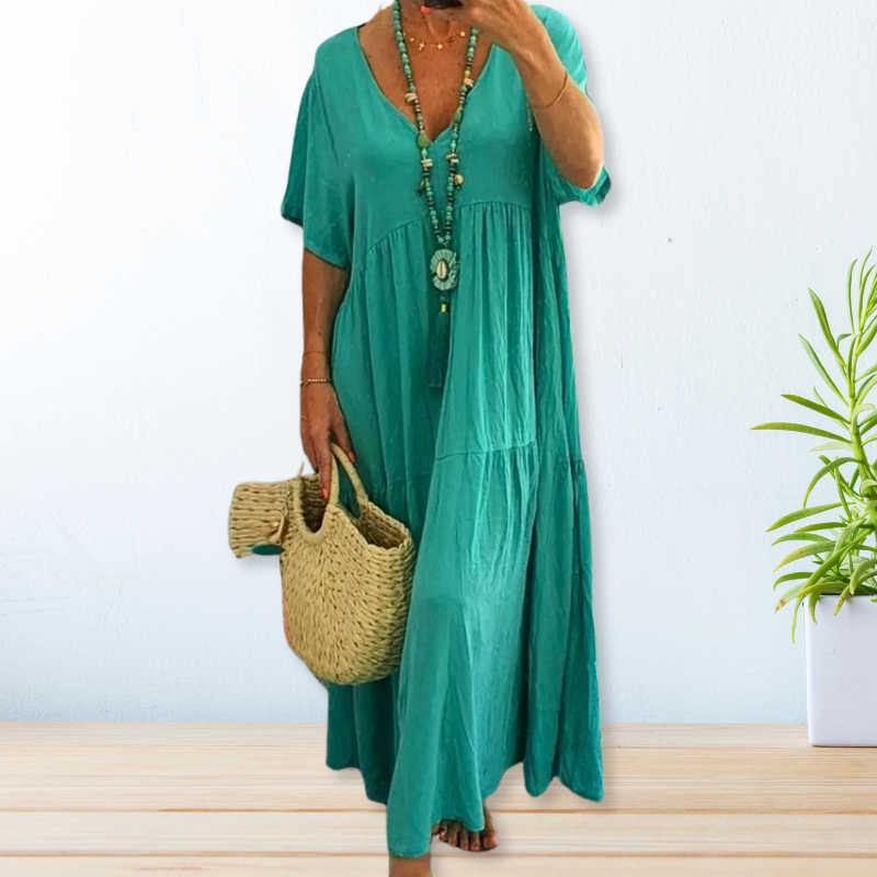 Women's draped elegant dress in natural tones with graceful silhouette and breathable relaxed fit