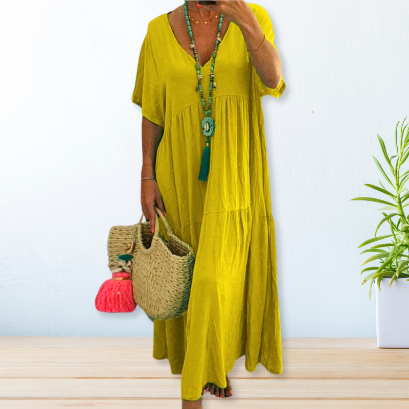 Women's elegant draped dress in natural tones, relaxed silhouette with graceful draping detail