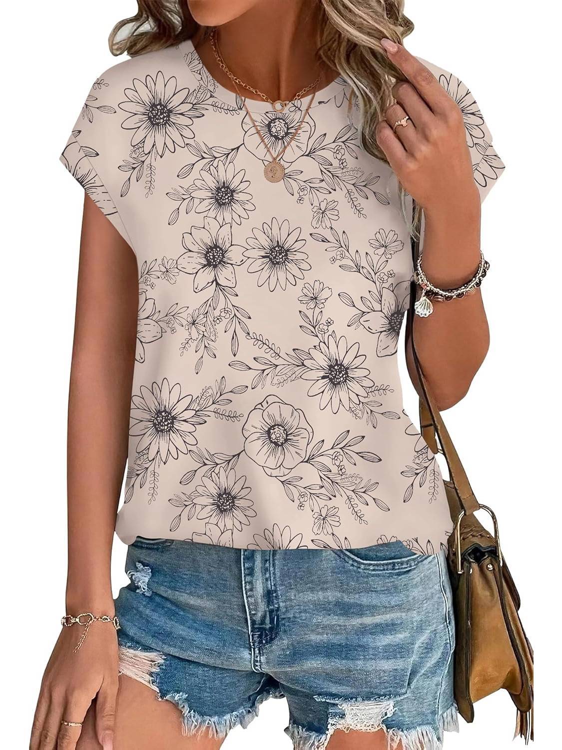 Women's leaf print crew neck cap sleeve casual top in sage, blue, and terracotta watercolor design