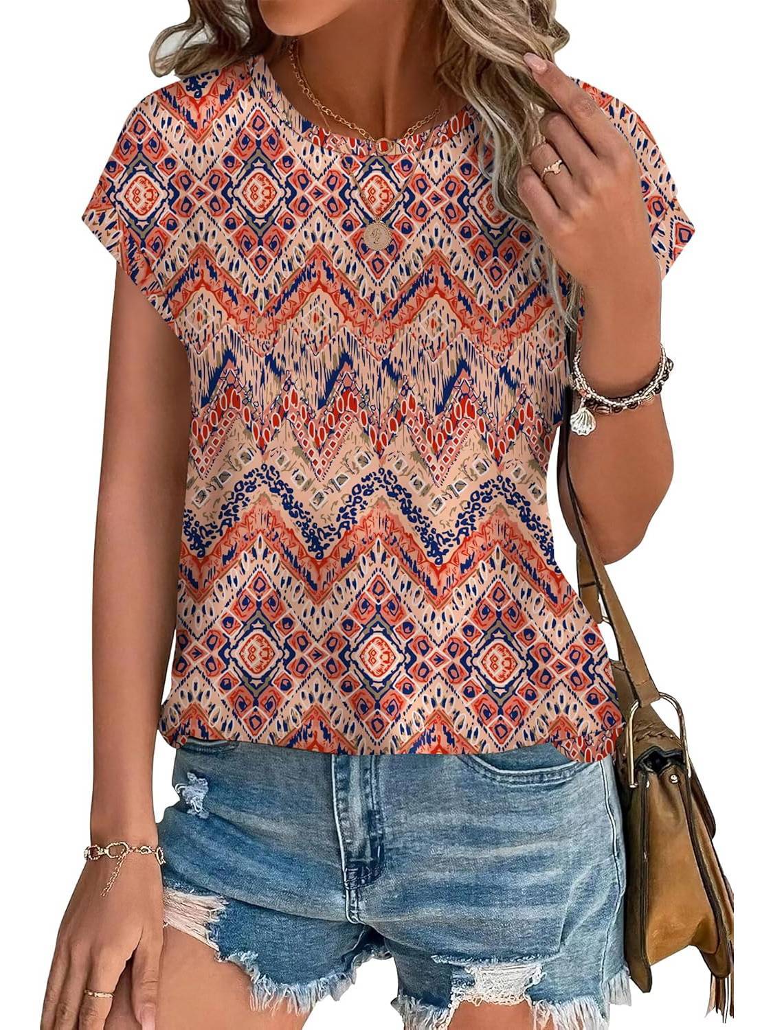 Women's leaf print crew neck cap sleeve top in sage, blue, and terracotta watercolor botanical print