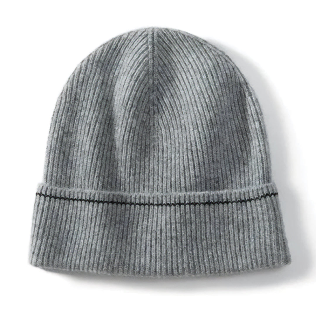 Ivory cashmere ribbed beanie with classic knit texture, lightweight luxury winter hat