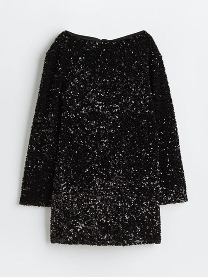 Silver sequin long-sleeve mini dress with open back and statement bow detail