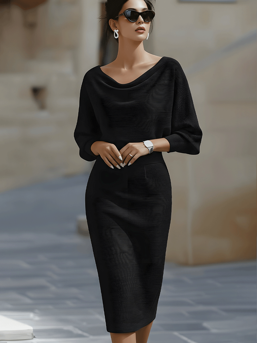 Luxurious fluid midi dress in elegant neutral tone with flattering silhouette and premium soft drape