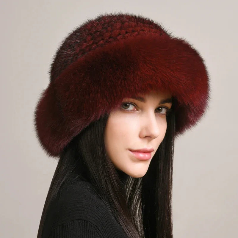 Solid fur hat with round crown silhouette and stylish fur brim for winter elegance
