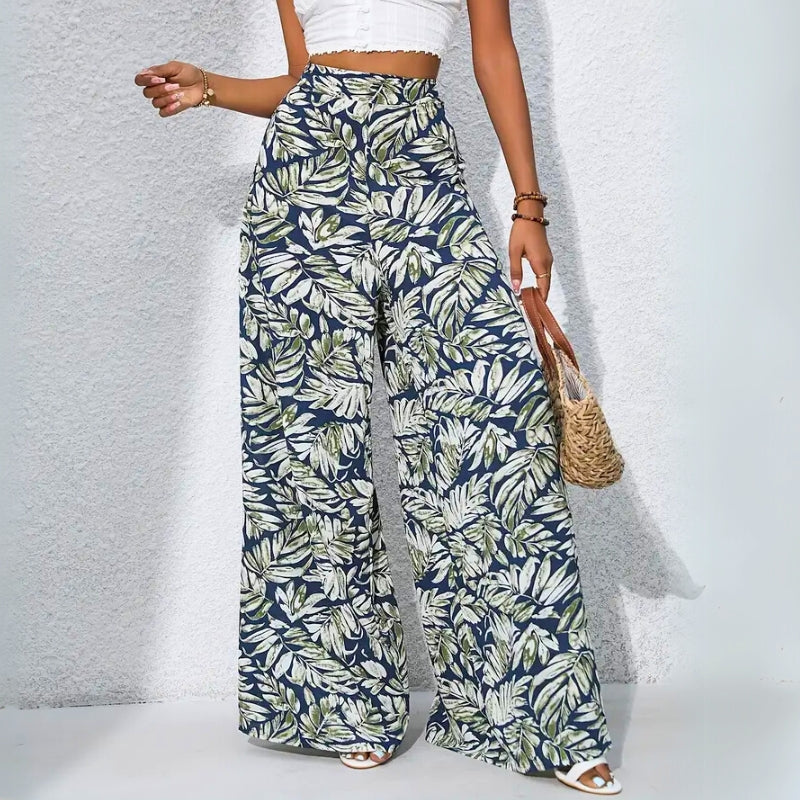Tropical print high-waist cotton trousers with roomy side pockets for a relaxed summer look
