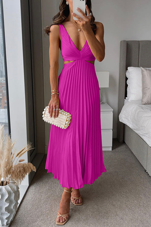 Women's floral maxi dress in soft pastel tones, flowing silhouette with elegant drape for wedding guest