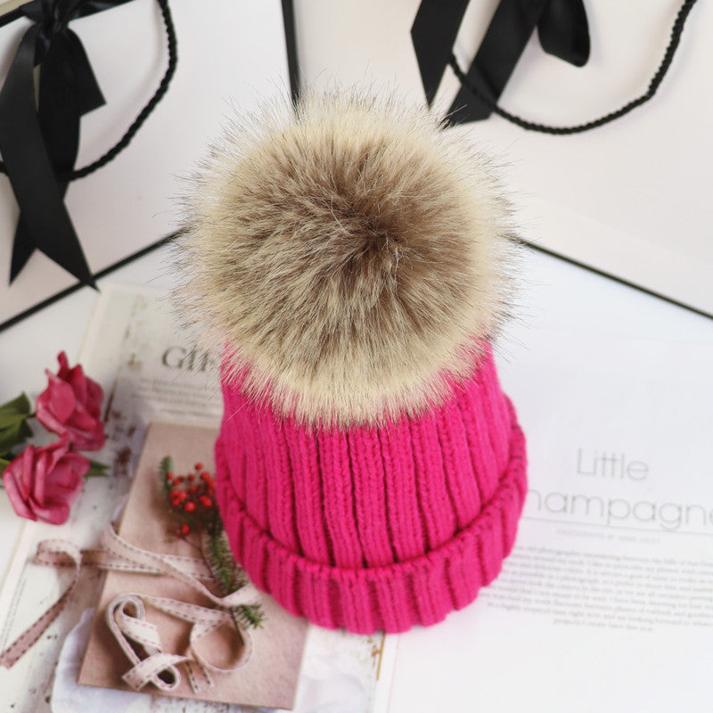Chunky knit beanie with fluffy pom-pom accent, cozy classic winter hat in neutral tone