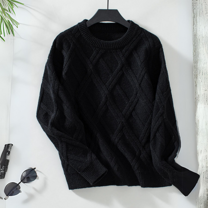 Ivory diamond knit sweater with round neckline, ribbed trims, and intricate light-catching texture