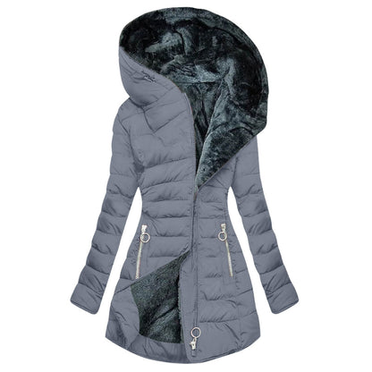 Nuvra oversized winter jacket with plush lining, sculpted shell, and cold-shield wrap hood