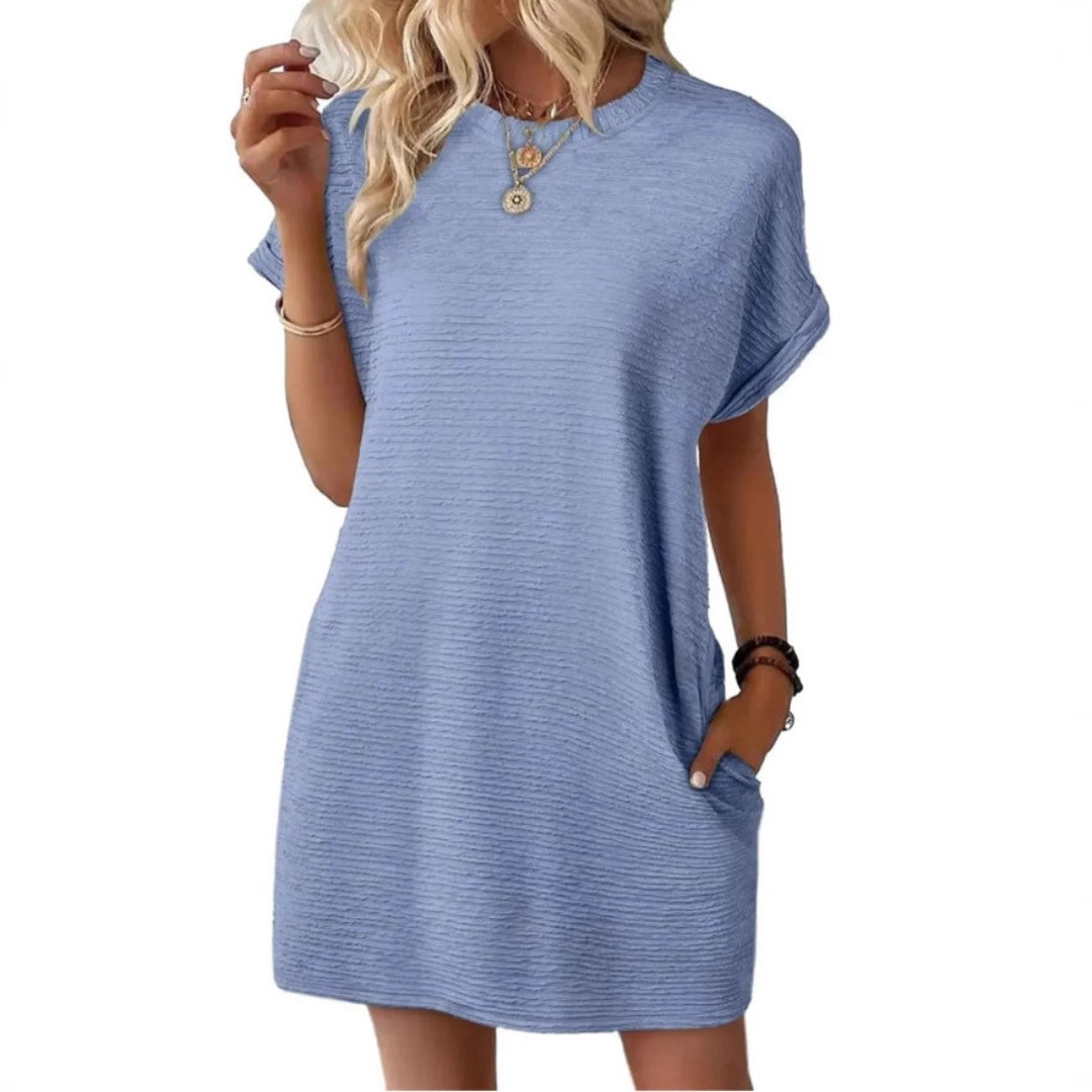 Hot pink ribbed crew neck mini dress with relaxed T-shirt silhouette and short sleeves