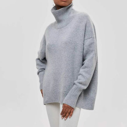 Oversized unisex turtleneck sweater in soft plush fine-knit fabric with cozy cotton-wool blend texture