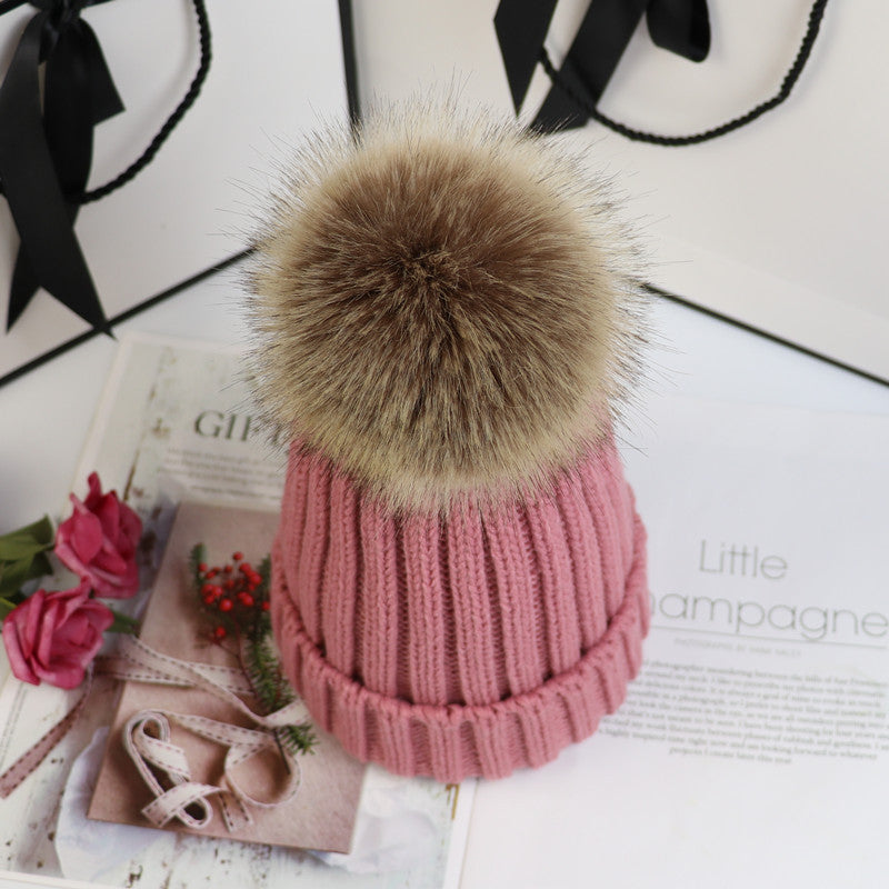 Chunky knit beanie with fluffy pom-pom accent, cozy classic winter hat in neutral tone