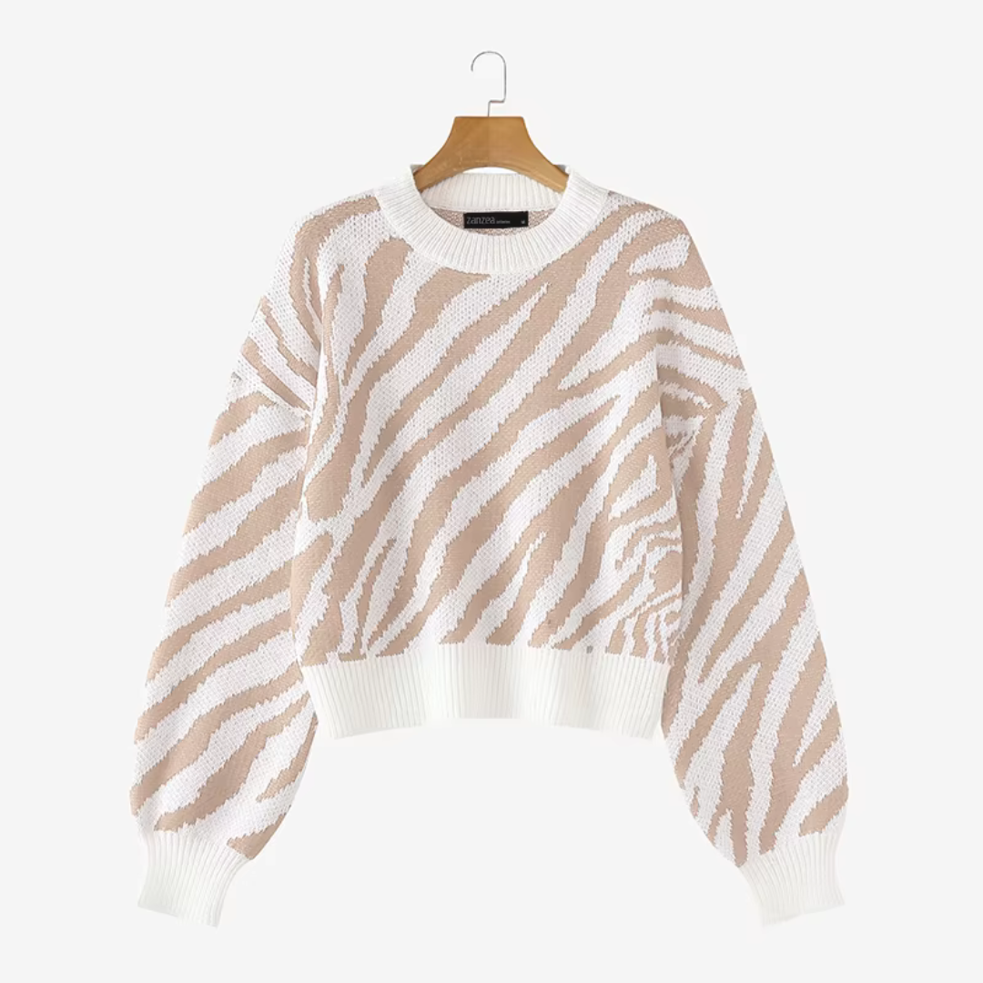 Livia oversized zebra striped knit sweater with ribbed cuffs in a relaxed silhouette