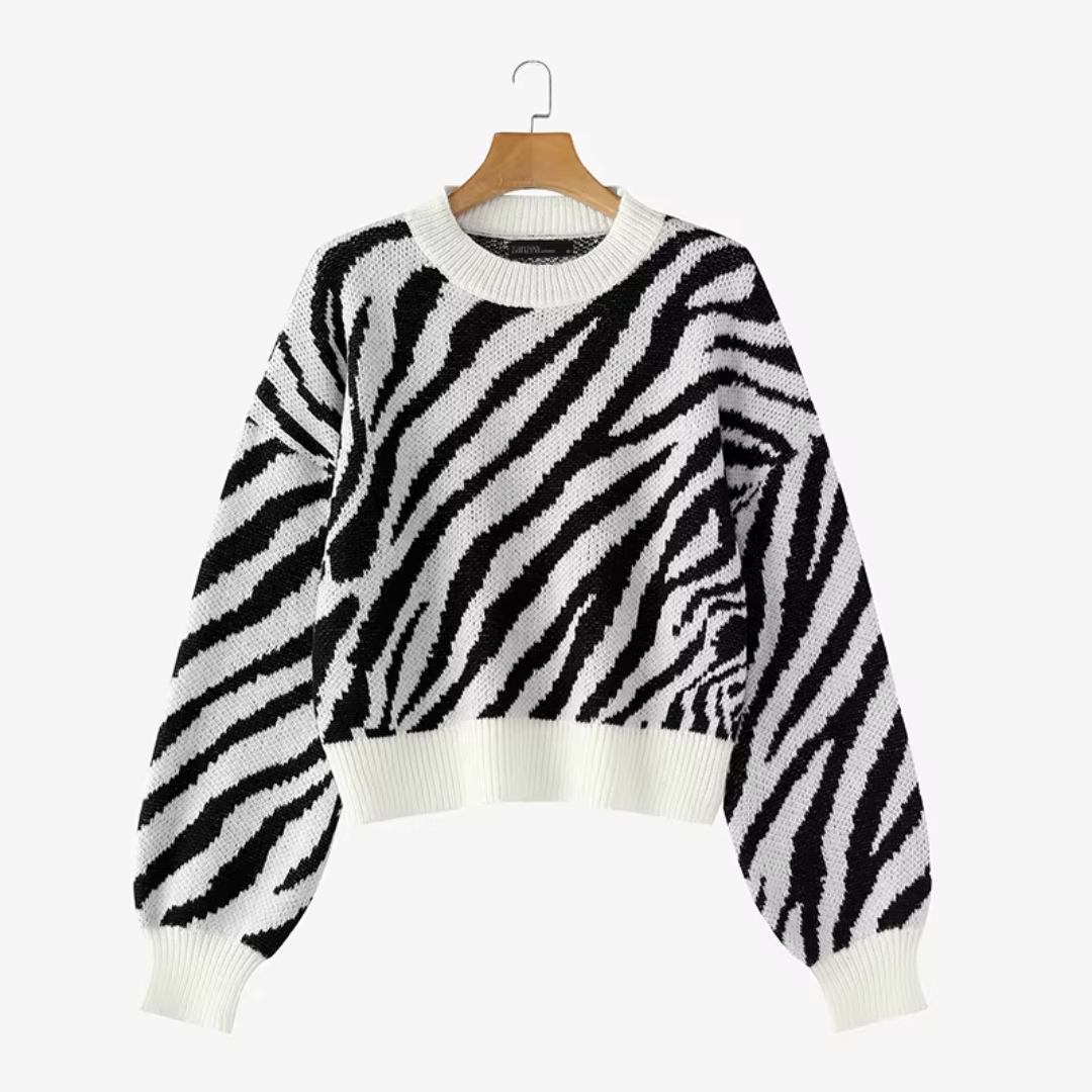 Livia oversized zebra striped knit sweater with ribbed cuffs in a relaxed silhouette
