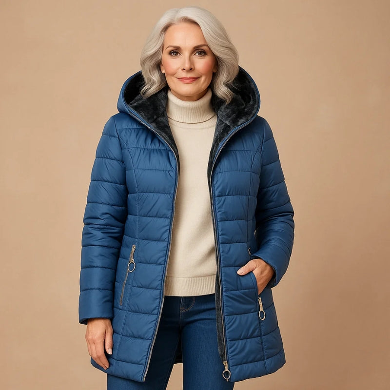 Nuvra oversized winter jacket with plush-lined hood, sculpted cold-shield shell, bulk-free warm fit