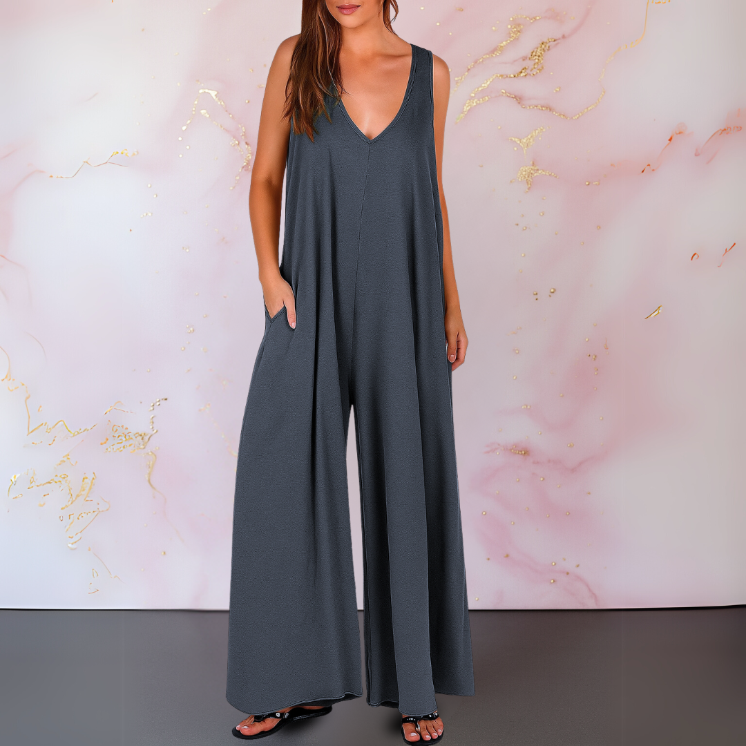 Black sleeveless wide-leg jumpsuit with deep V-neckline, flowing silhouette, and side pockets