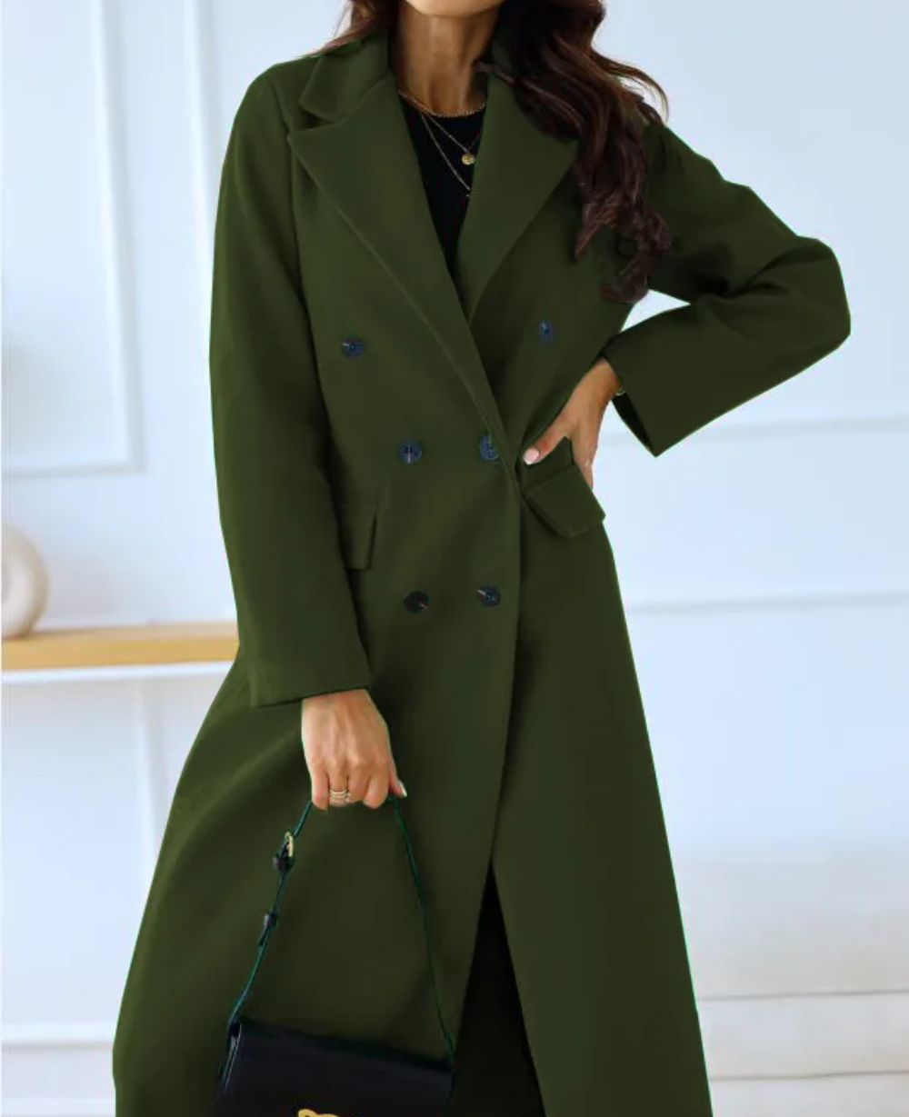 Beige fitted double-breasted trench coat with classic notched lapel and tailored silhouette