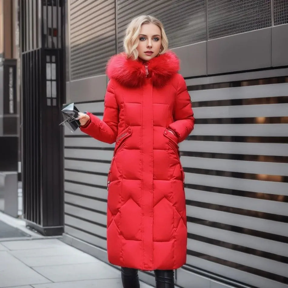 Women's long quilted winter coat with hood trim, cozy flattering silhouette in elegant cold-weather style
