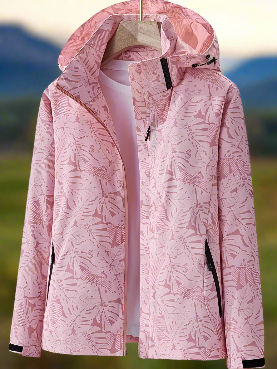 Women's lightweight waterproof summer jacket in bold leaf print with adjustable fit