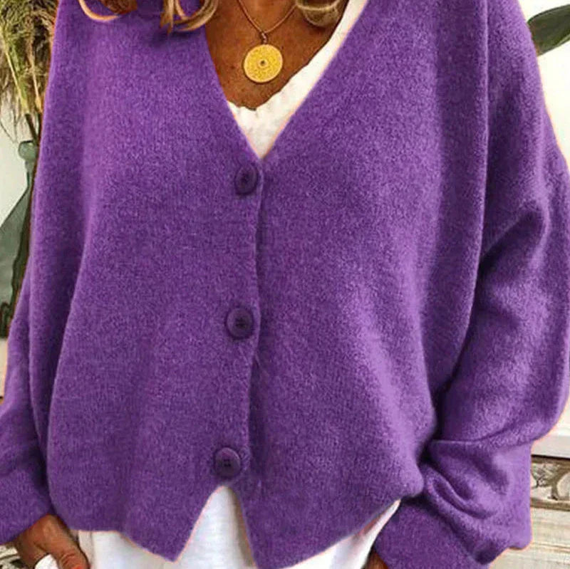 Women's loose fit V-neck knit cardigan in cozy neutral tones with classic button-front closure
