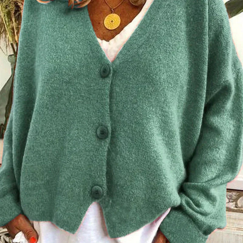 Women's loose fit V-neck knit cardigan in cozy neutral tones with classic button front closure