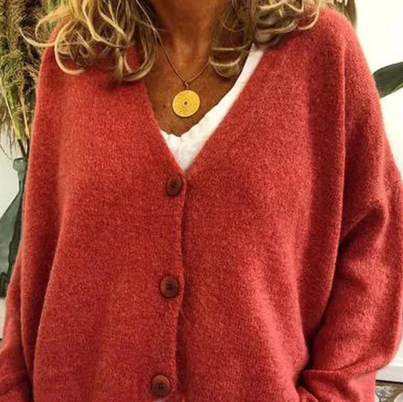 Women's loose fit V-neck knit cardigan in cozy fabric with classic button-front closure for effortless layering