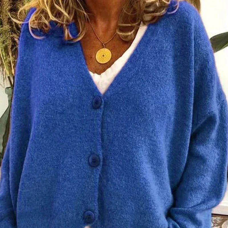 Women's loose fit V-neck cozy knit cardigan in neutral tone with classic button front closure