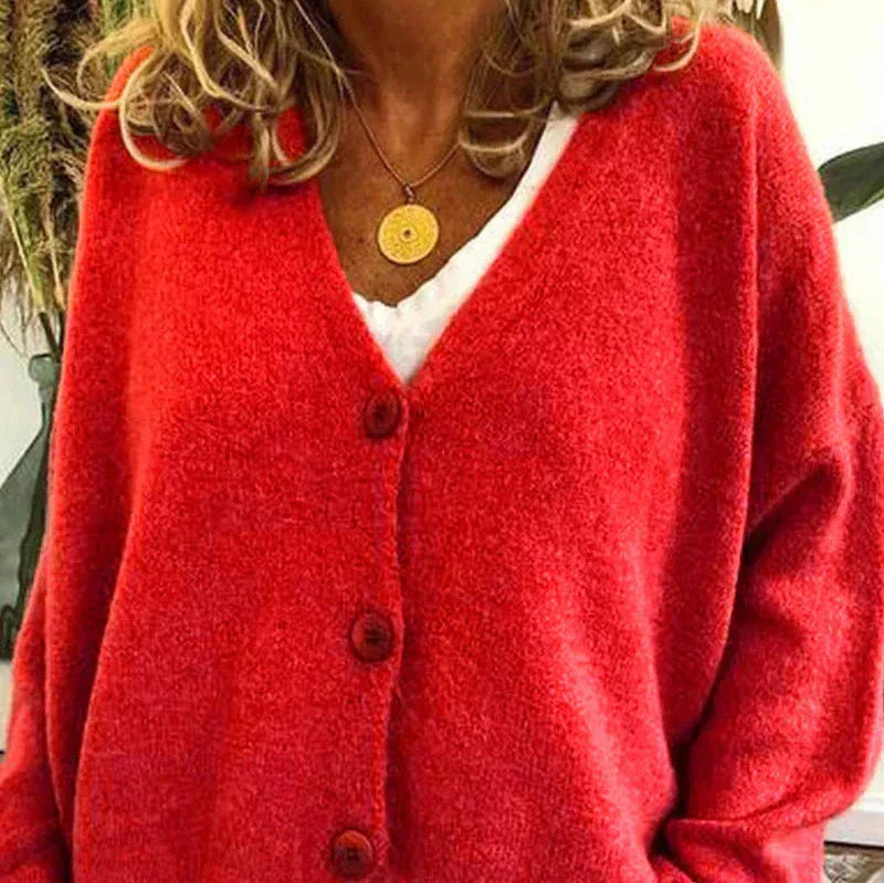 Women's loose fit V-neck cozy knit cardigan in neutral tone with classic button front closure