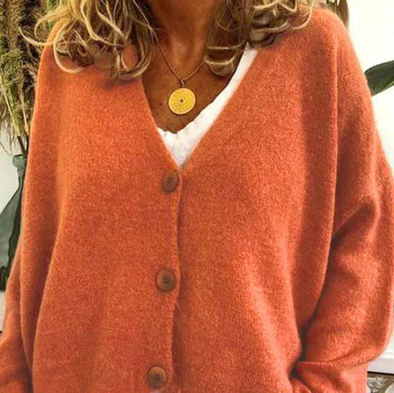Women's loose fit V-neck knit cardigan in cozy neutral tones with classic button-front closure