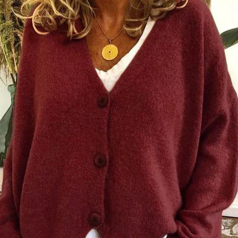 Women's loose fit v-neck knit cardigan in cozy relaxed silhouette with classic button front closure