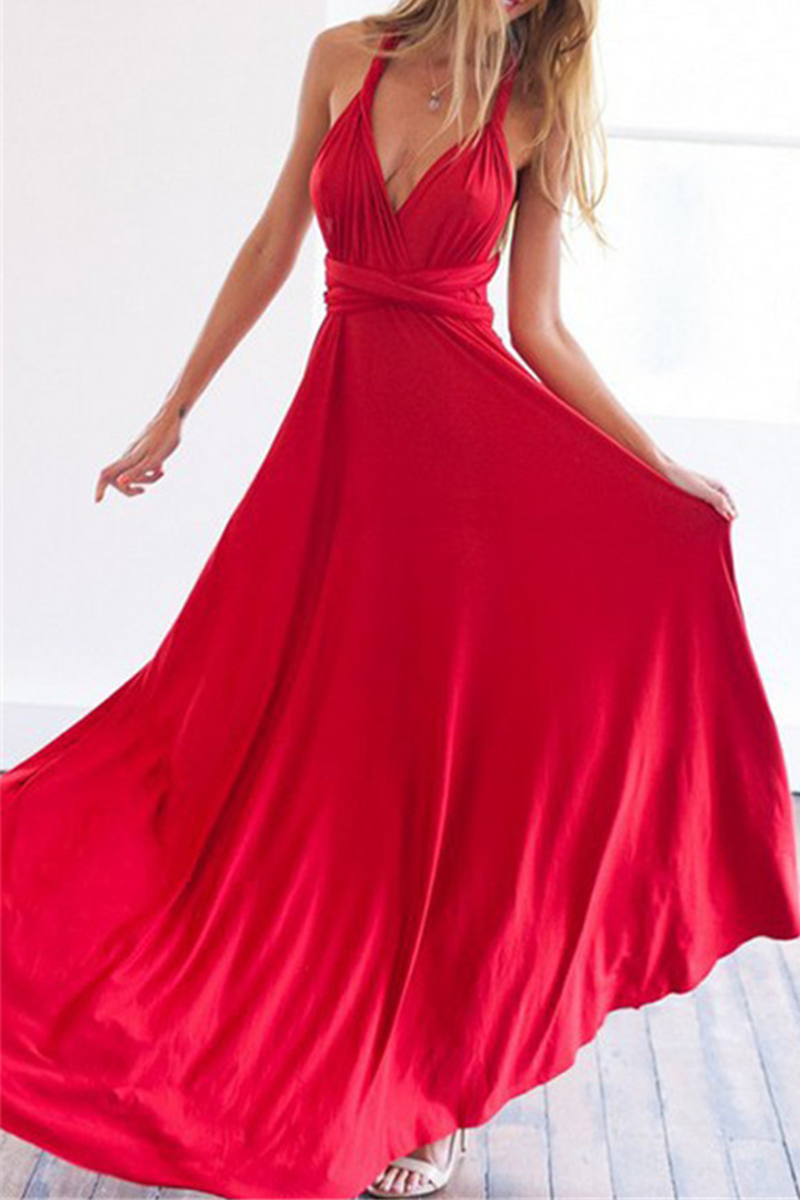 Women's elegant floor-length halterneck A-line party dress with high slit, timeless feminine silhouette