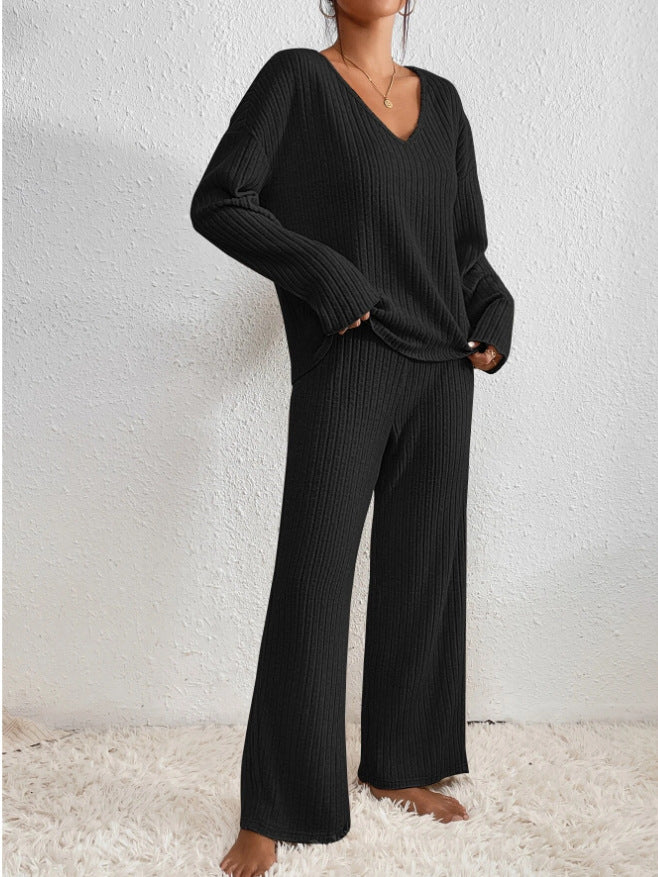 Ribbed knit 2-piece lounge set in neutral tones with V-neck sweater and relaxed-fit matching trousers