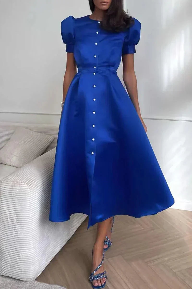 Ivory satin midi dress with A-line cut, puff sleeves, and elegant button front closure