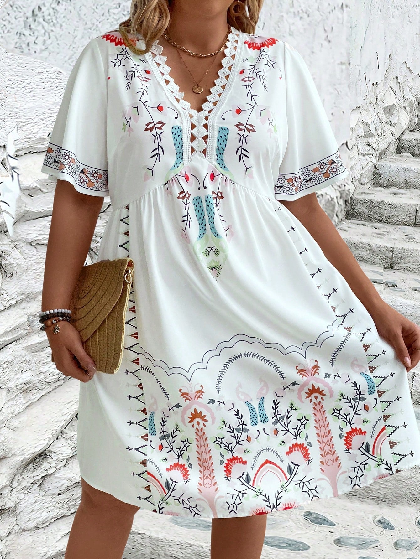 Plus size boho midi dress with floral geometric embroidery hem, relaxed silhouette, carefree wanderlust style
