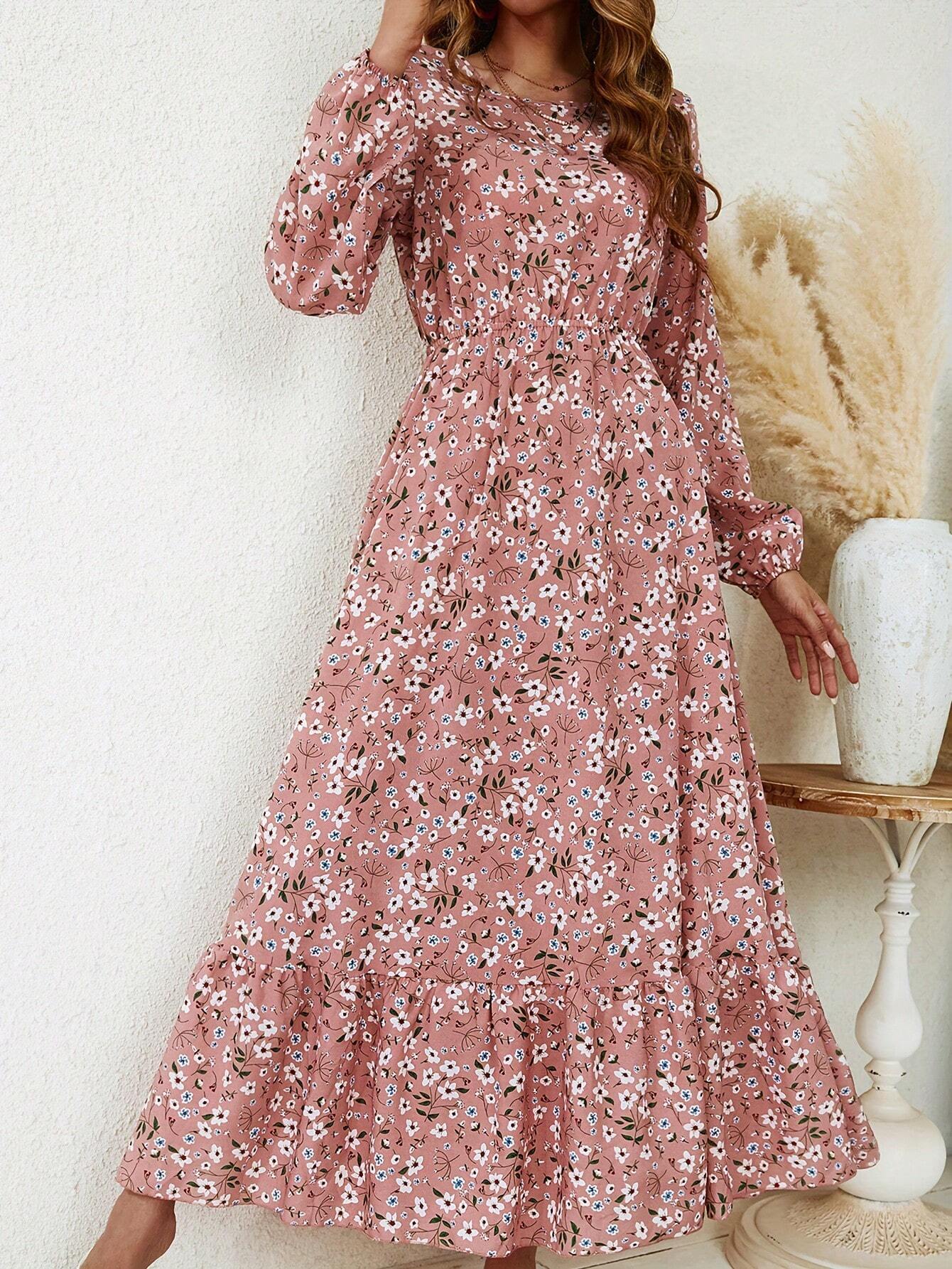 Women's floral print maxi dress with bishop sleeves, smocked waist, and flowing A-line silhouette
