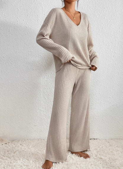 Ribbed knit 2-piece lounge set in neutral tones with V-neck sweater and matching relaxed-fit trousers
