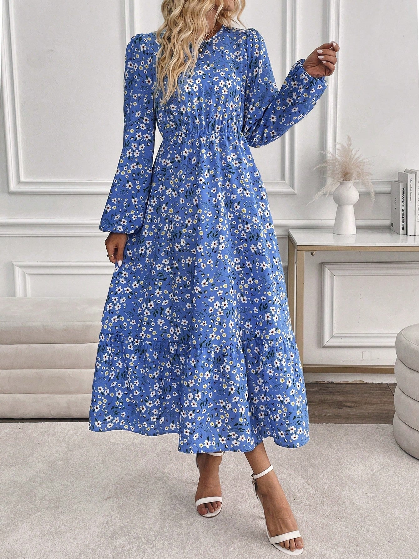Women's floral print maxi dress with bishop sleeves, smocked waist, and flowing A-line silhouette