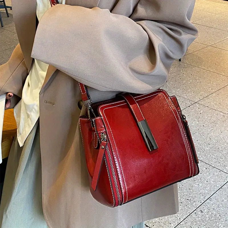 Wavlynn Cathy structured leather crossbody bag with adjustable shoulder strap and top handle