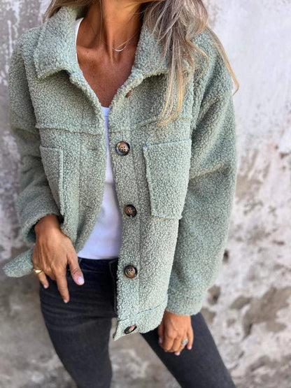 Women's short lapel collar jacket in warm tones, soft textured fabric with flattering autumn silhouette