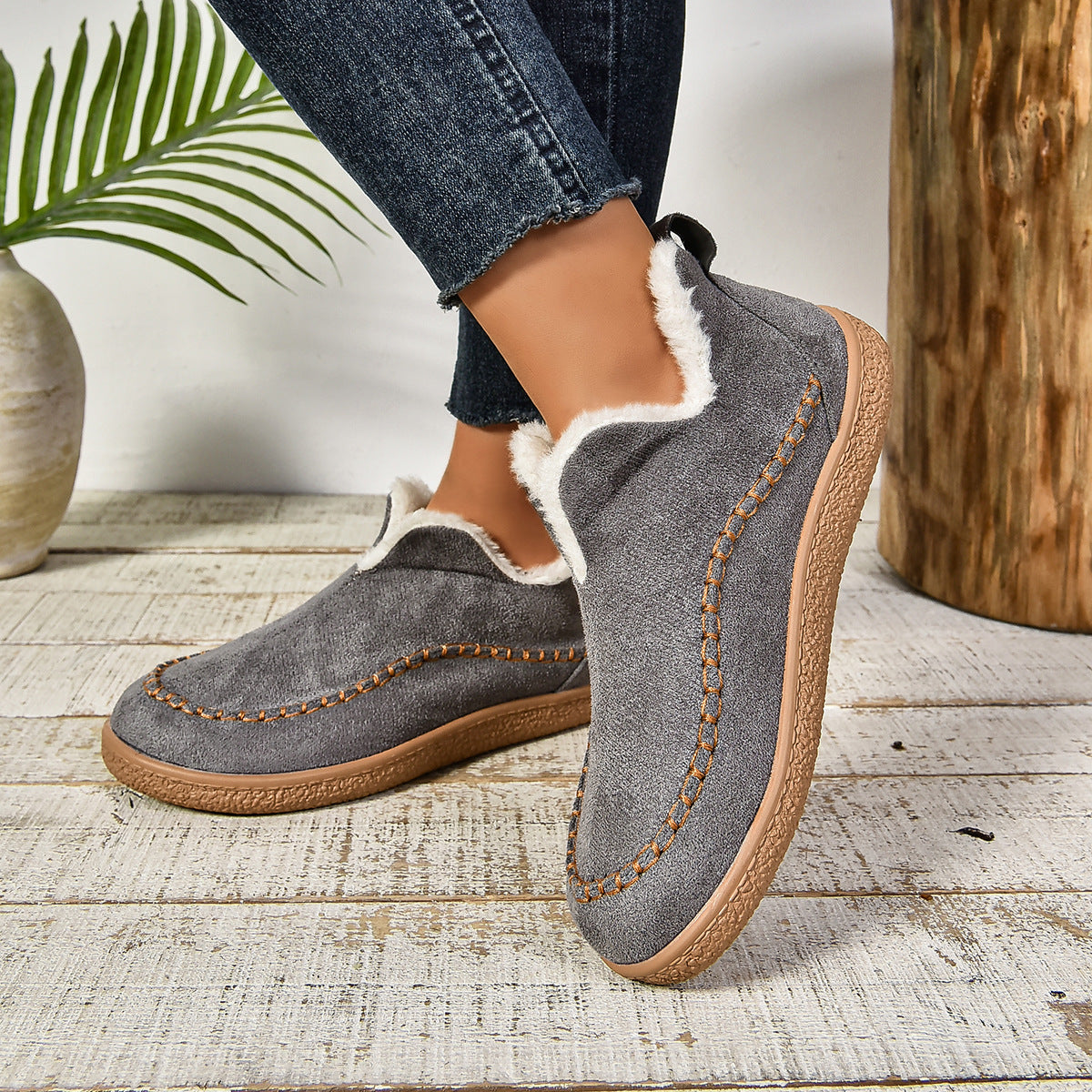 Warm fur-lined slip-on ankle boots with thick anti-slip sole, sleek silhouette, cozy winter style