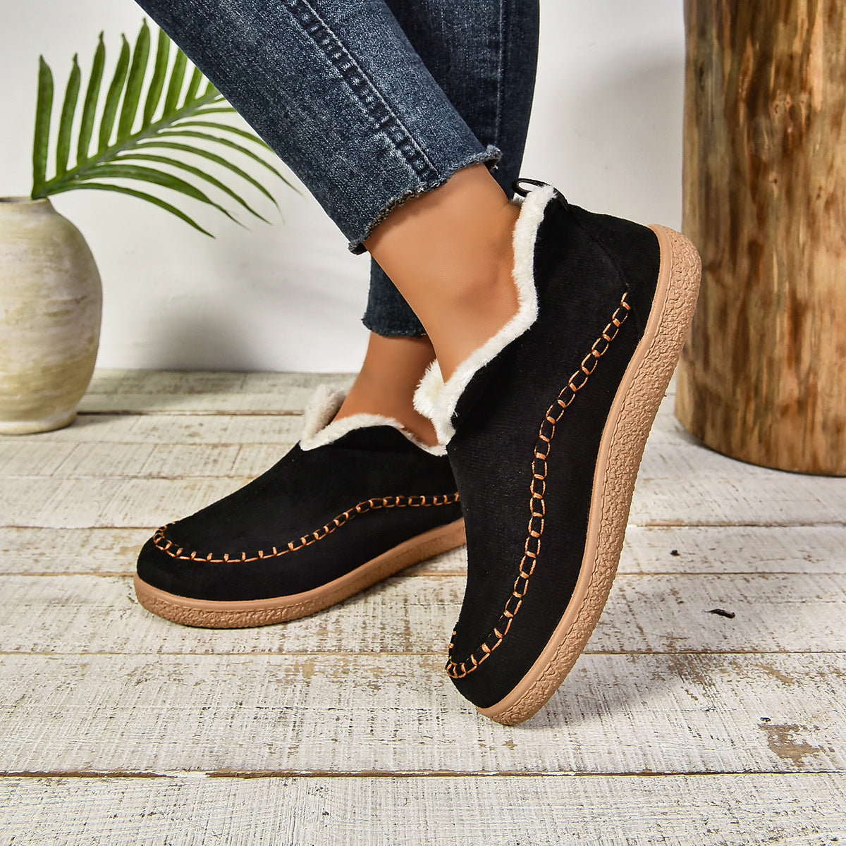 Warm fur-lined slip-on ankle boots with thick anti-slip sole, sleek silhouette, ankle-height cut