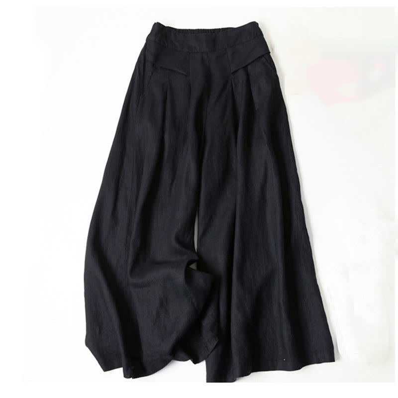 Marisa wide-leg relaxed pants in neutral tone with flattering high waist and soft draping silhouette