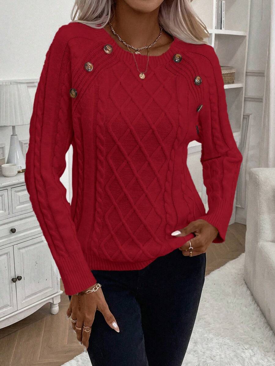 Cream cable-knit jumper with elegant button detail, cozy classic fit for winter warmth