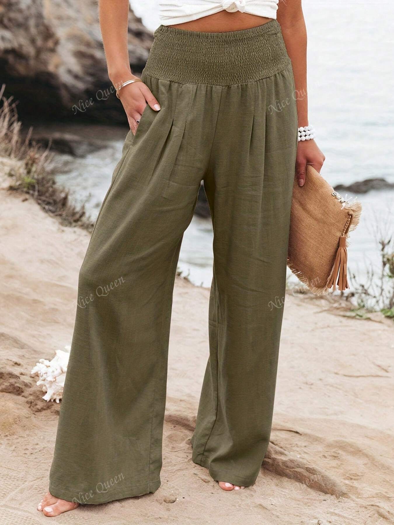 Wide leg linen pants in neutral tone relaxed silhouette with breathable fabric and effortless drape