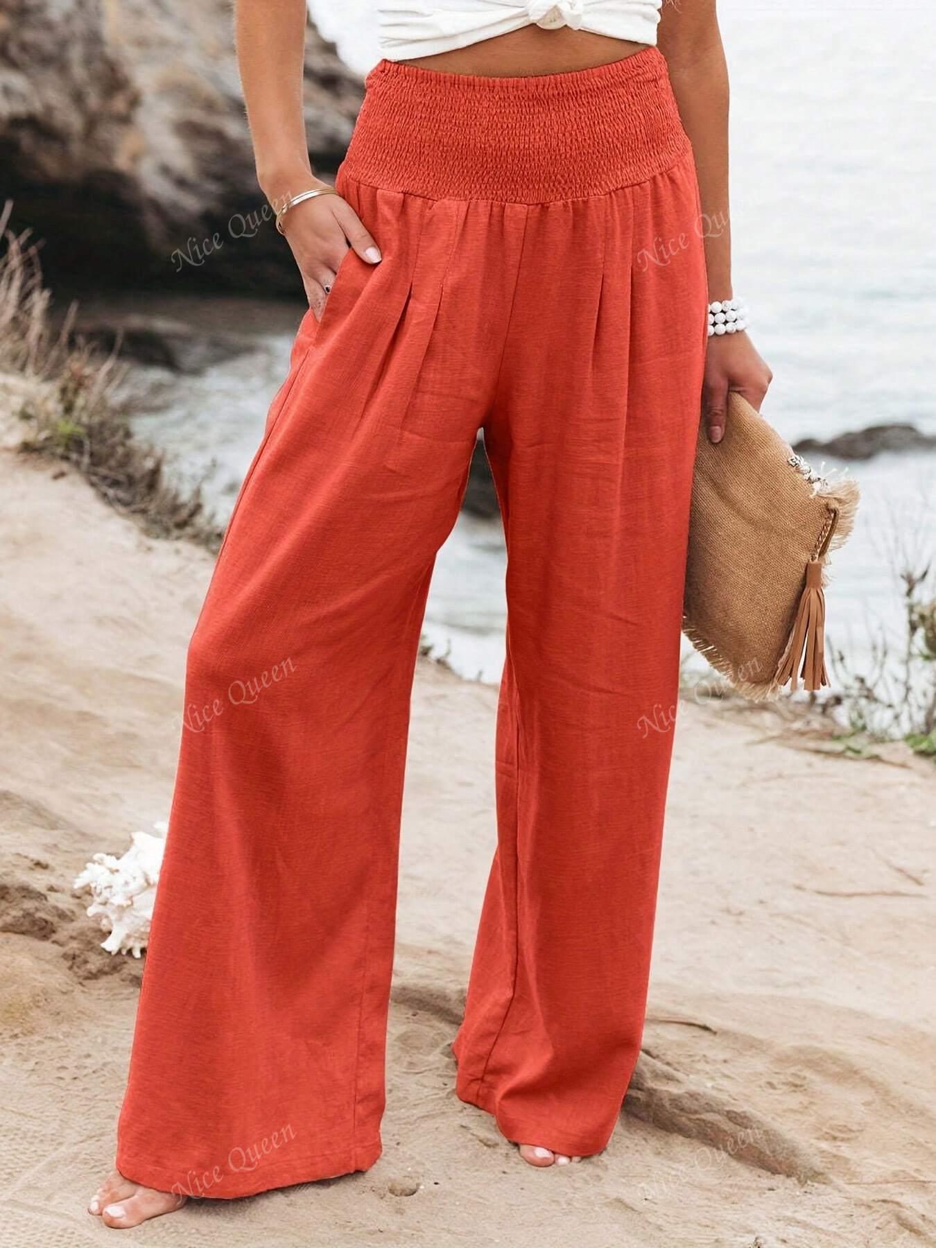 Wide leg linen pants in neutral tone, relaxed silhouette with effortless drape for casual chic style